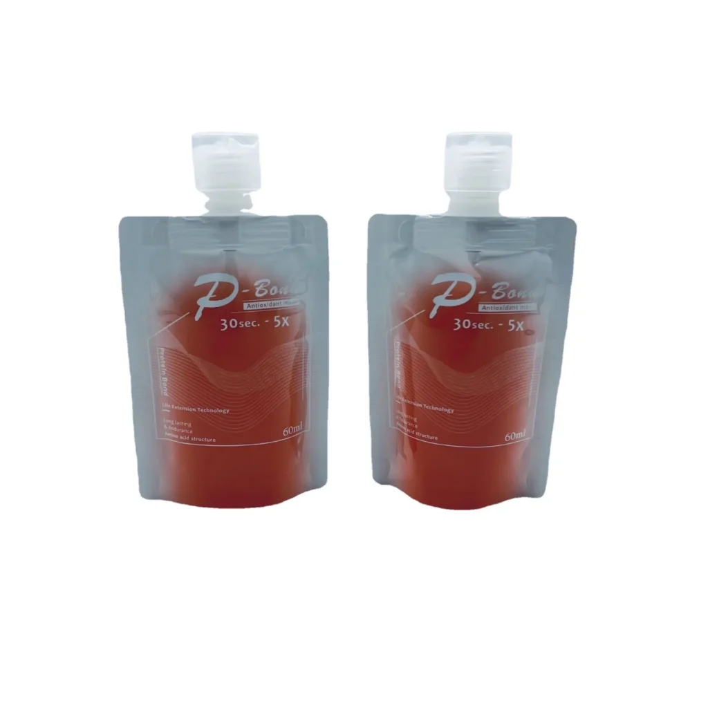 Shampooflasche mit Ausgießer, befüllt mit einer Kolben-Flüssigkeitsabfüllmaschine